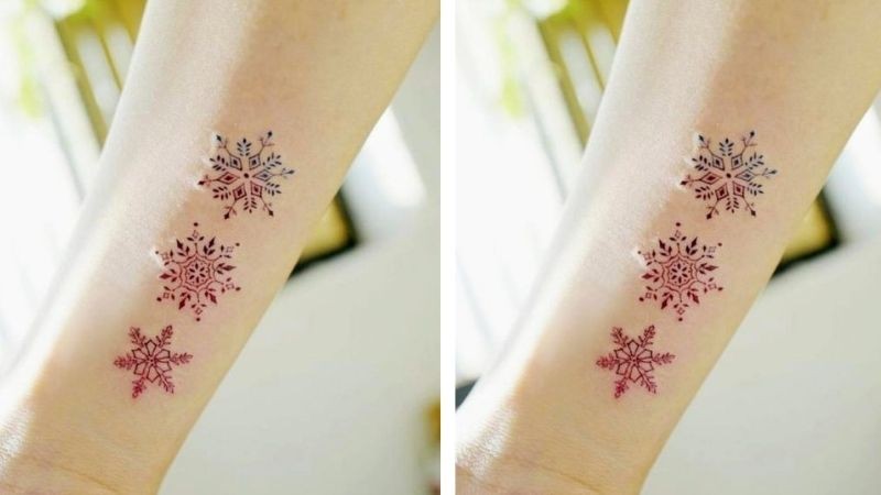 Hình xăm bông tuyết màu hồng trên cổ tay cho nữ