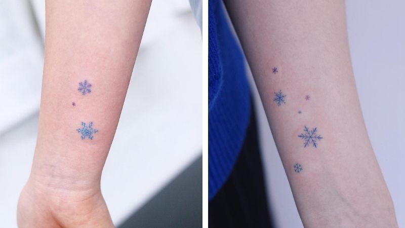 Hình xăm bông tuyết mực xanh trên cổ tay