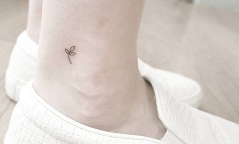 Hình xăm cỏ ba lá tượng trưng cho may mắn