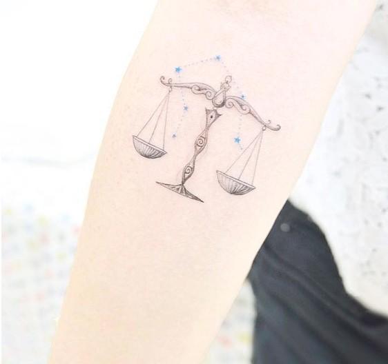 Hình xăm cung Thiên Bình tượng trưng cho sự hòa bình